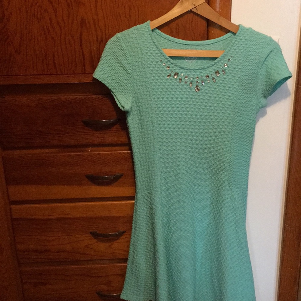 Long turquoise dress with rind stone details by SO